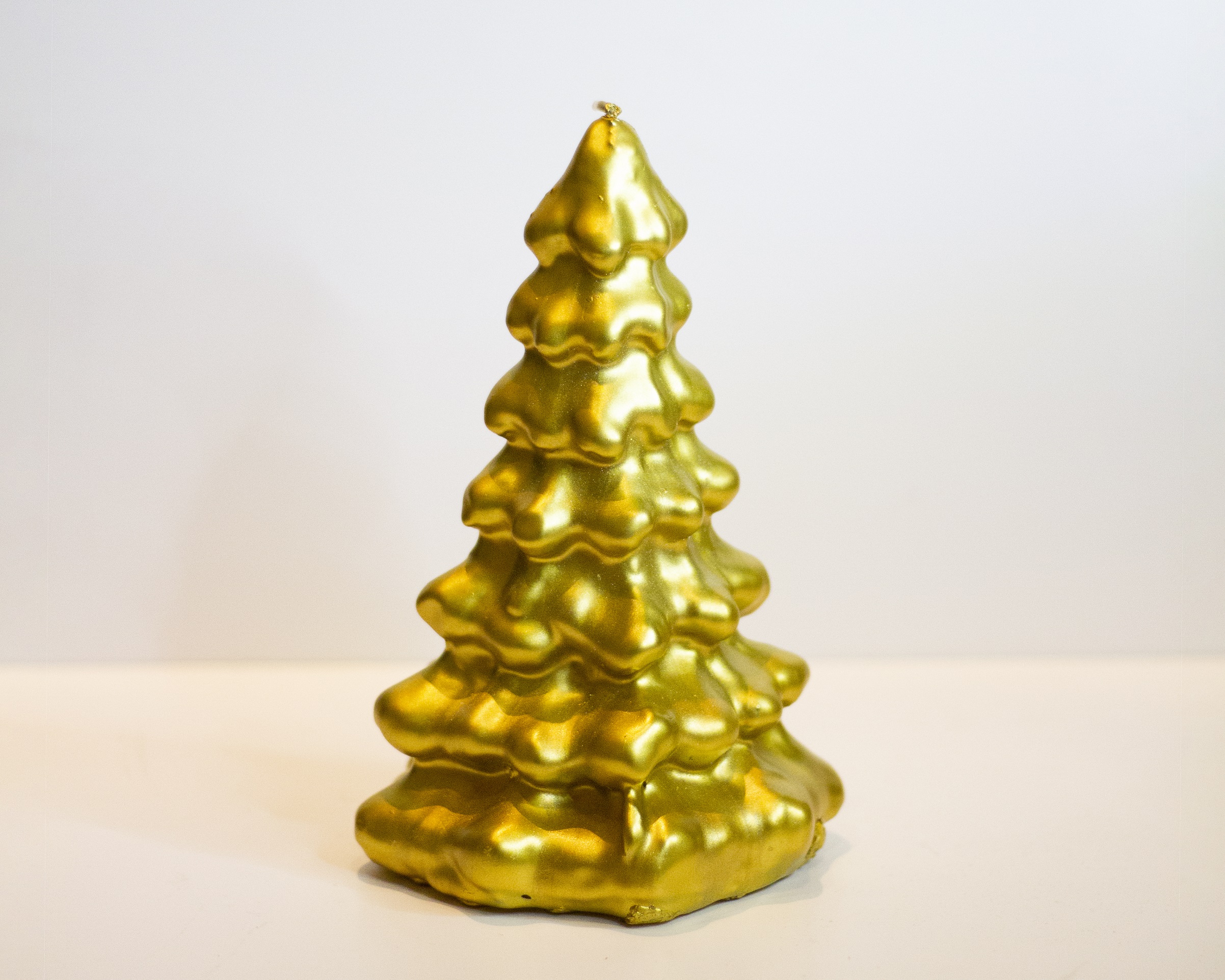 Imagen destacada de 'Vela árbol de navidad oro'